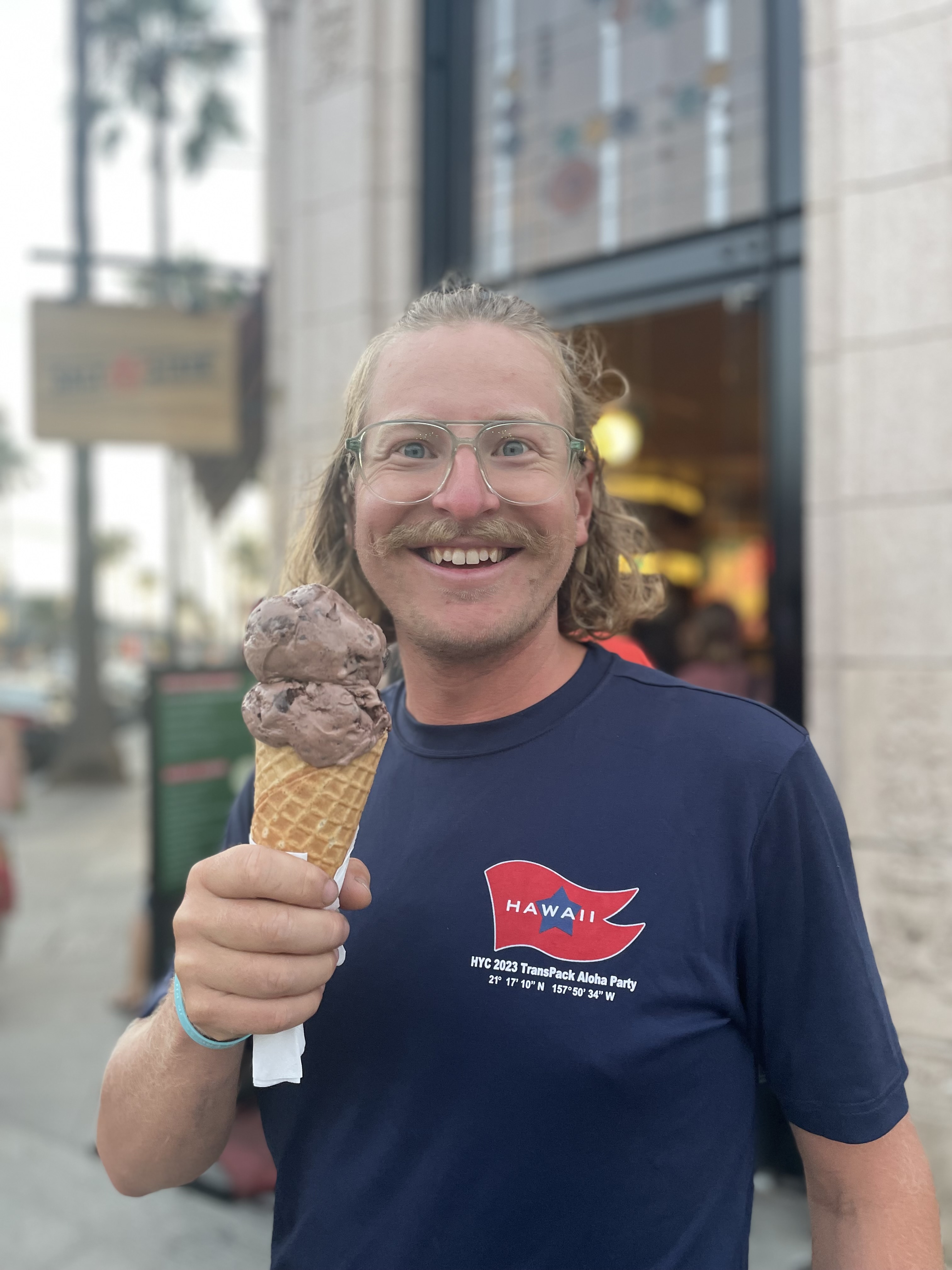 Smiling, eating ice cream while rocking my Hawaii YC shirt